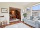 Comfortable living room with view into dining room, and flooded with natural light at 1468 Blackthorne N Trl, Plainfield, IN 46168