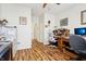 Functional home office features a rolltop desk, laminate floors, and ample storage at 1468 Blackthorne N Trl, Plainfield, IN 46168