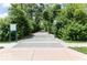 Path through lush greenery provides residents direct access to community walking trail at 17399 Dovehouse Ln, Westfield, IN 46074