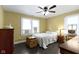 Comfortable bedroom with natural light, warm colors, and ample closet space throughout at 236 W 33Rd St, Indianapolis, IN 46208