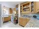 Charming kitchen featuring custom cabinets, granite countertops and stainless steel appliances at 236 W 33Rd St, Indianapolis, IN 46208