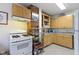Well-equipped kitchen with modern appliances and ample storage space for convenience at 236 W 33Rd St, Indianapolis, IN 46208
