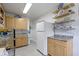 Functional kitchenette design with custom cabinets, and granite countertops for style at 236 W 33Rd St, Indianapolis, IN 46208