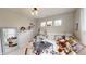 Bright bedroom featuring a vanity and natural light streaming through large windows at 247 Poplar St, Westfield, IN 46074