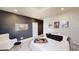 Elegant bedroom with modern decor, stylish accents, and comfortable seating area at 247 Poplar St, Westfield, IN 46074