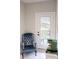 Cozy hallway with a comfortable chair and a view of the outdoor balcony at 247 Poplar St, Westfield, IN 46074
