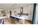 Stylish kitchen featuring modern appliances, a breakfast bar, and elegant lighting fixtures at 247 Poplar St, Westfield, IN 46074