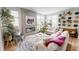 Comfortable living room with fireplace, large windows, and contemporary decor at 247 Poplar St, Westfield, IN 46074