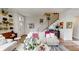 Cozy living room featuring a comfortable sofa, stylish decor, and a staircase at 247 Poplar St, Westfield, IN 46074