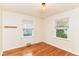 Bright bedroom with hardwood floors, natural light and modern fixture at 2526 Dell Zell Dr, Indianapolis, IN 46220