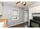 Kitchen showcasing white cabinets, butcher block countertops and black appliances at 2526 Dell Zell Dr, Indianapolis, IN 46220