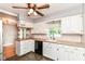 Kitchen featuring white cabinets, butcher block countertops, stainless appliances and tile flooring at 2526 Dell Zell Dr, Indianapolis, IN 46220
