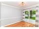Bright living room with hardwood floors and sliding doors leading to the backyard at 2526 Dell Zell Dr, Indianapolis, IN 46220