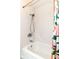 Clean bathroom shower with white tile and a shower curtain at 2526 Dell Zell Dr, Indianapolis, IN 46220