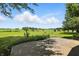 Expansive backyard view from patio featuring lush greenery and open space, offering a tranquil outdoor experience at 25420 Jerkwater Rd, Sheridan, IN 46069