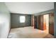 Spacious bedroom with carpet, neutral decor, and an open door to an adjoining bathroom at 25420 Jerkwater Rd, Sheridan, IN 46069