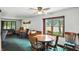 Cozy dining area situated between the living room and kitchen with natural light and ceiling fan at 25420 Jerkwater Rd, Sheridan, IN 46069