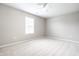 Bedroom with a ceiling fan, window with blinds and neutral carpet at 321 Virginia St, Fortville, IN 46040