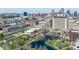 Overhead view of an urban setting featuring lush greenery, ponds, and prominent buildings at 326 Parkway Ave, Indianapolis, IN 46225