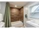 Bathroom featuring tiled walls in the shower and a modern sink and fixtures at 326 Parkway Ave, Indianapolis, IN 46225