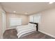 Bedroom boasts plush carpet, natural light, and a spacious closet at 326 Parkway Ave, Indianapolis, IN 46225
