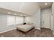 Spacious bedroom boasts plush carpet, recessed lighting, and bright windows at 326 Parkway Ave, Indianapolis, IN 46225