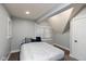 Cozy bedroom with neutral walls and a window with white blinds at 326 Parkway Ave, Indianapolis, IN 46225