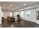 Bright and airy living room with recessed lighting, hardwood floors, and plenty of natural light from multiple windows at 326 Parkway Ave, Indianapolis, IN 46225