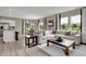 Bright and airy living room with a modern sofa, large windows, and an open layout at 3794 Cantebury Dr, Franklin, IN 46131