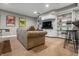 Inviting basement with a plush sofa, custom shelving, and entertainment setup for relaxing at 4013 Hillendale Dr, Greenwood, IN 46142