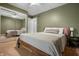 Bedroom with a full bed, mirrored closet, and a ceiling fan at 4013 Hillendale Dr, Greenwood, IN 46142