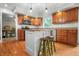 Bright kitchen featuring stainless appliances, granite countertops, and hardwood floors at 4013 Hillendale Dr, Greenwood, IN 46142