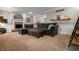 Inviting living room features a cozy fireplace, neutral color palette, and plush carpeting at 4013 Hillendale Dr, Greenwood, IN 46142