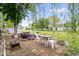 Outdoor patio and lawn area with seating for entertaining and enjoying the backyard at 4016 Dogwood Ln, Franklin, IN 46131