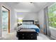 Inviting bedroom with a comfortable bed, bedside tables, and a bright window at 4016 Dogwood Ln, Franklin, IN 46131