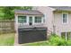 Backyard with a hot tub and small patio at 426 Tipton Ln, Columbus, IN 47201