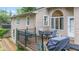 Deck features an outdoor dining area, grill, and view of the backyard at 426 Tipton Ln, Columbus, IN 47201