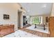 Bright living room featuring hardwood floors, neutral walls, and a view of the front yard at 426 Tipton Ln, Columbus, IN 47201