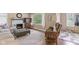 Spacious living room with hardwood floors, a fireplace, and comfortable seating at 426 Tipton Ln, Columbus, IN 47201
