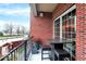 Relax on this private balcony with brick surround and enjoy outdoor seating, great for entertaining at 435 Virginia Ave # 108, Indianapolis, IN 46203