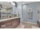 Stylish bathroom showcasing a double vanity, spacious layout, and glass shower enclosure at 435 Virginia Ave # 108, Indianapolis, IN 46203