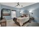 Calming bedroom with large windows, a ceiling fan, and ample natural light at 435 Virginia Ave # 108, Indianapolis, IN 46203