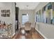 Cozy dining area with modern decor and a view of a bar cart and living area at 435 Virginia Ave # 108, Indianapolis, IN 46203