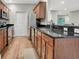Spacious kitchen with stainless appliances, granite countertops, and breakfast bar seating at 435 Virginia Ave # 108, Indianapolis, IN 46203
