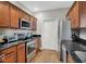 Well-equipped kitchen featuring stainless steel appliances, granite countertops, and ample cabinet space at 435 Virginia Ave # 108, Indianapolis, IN 46203
