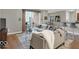 Inviting condo living area with neutral tones, bar seating, and plenty of light at 435 Virginia Ave # 108, Indianapolis, IN 46203