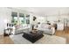 Bright open concept floor plan featuring a living room with two sofas and lots of natural light at 4397 Persian St, Greenwood, IN 46143