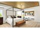 Inviting main bedroom featuring a king-size bed and a decorative wood ceiling at 4397 Persian St, Greenwood, IN 46143