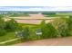 Aerial view of the property with house, barn, and fields at 4605 S 150 W, Columbus, IN 47201