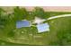 Birds eye view of a home and barn with long driveway at 4605 S 150 W, Columbus, IN 47201